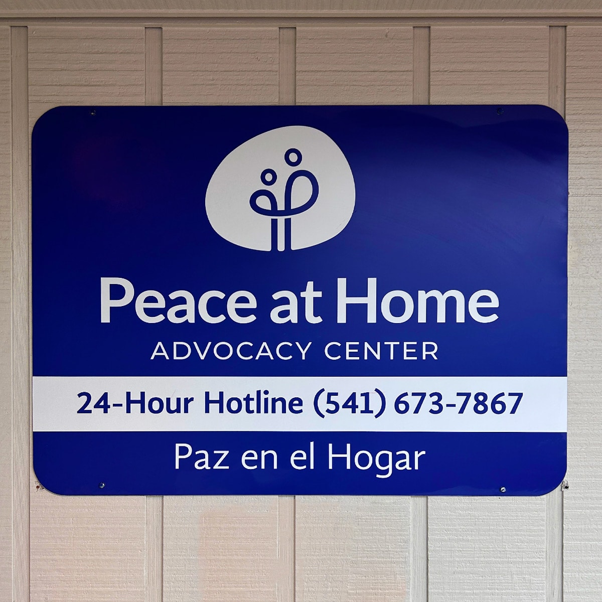 Building sign for Peace at Home Advocacy Center.